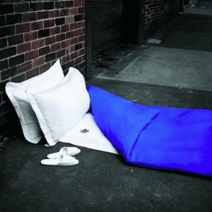 Sleeping bag with cushions, on the street