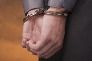 businessman in handcuffs